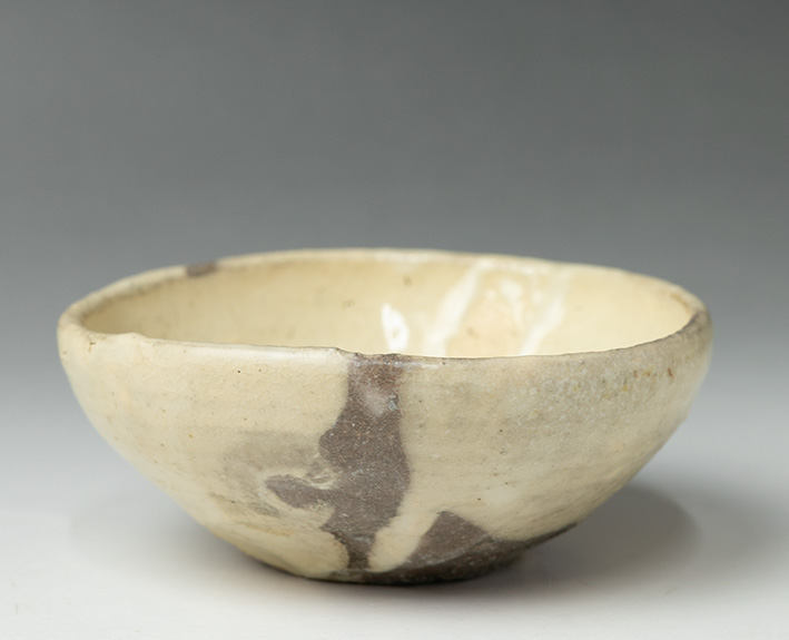 The side view of Muji Karatsu sakazuki sake cup