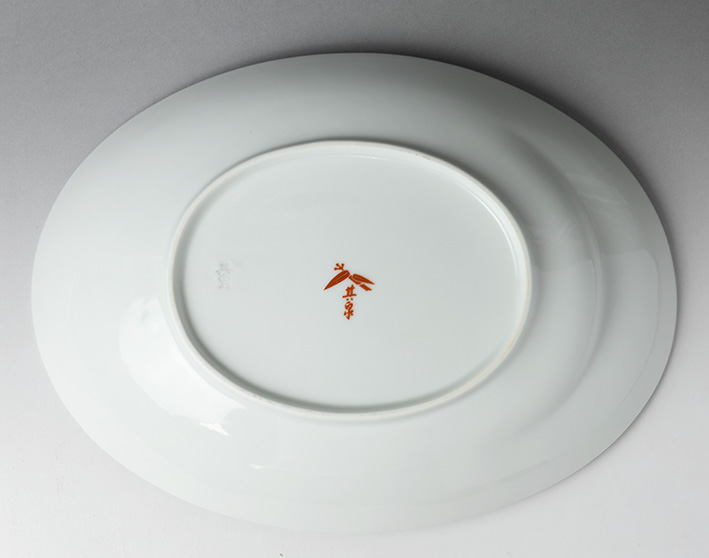 Oval bowl with Patchwork of Traditonal Patterns Design - bottom view