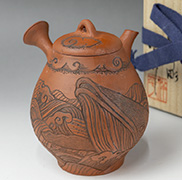 Japanese pottery - Whale engraved shudei teapot by Konishi Yohei